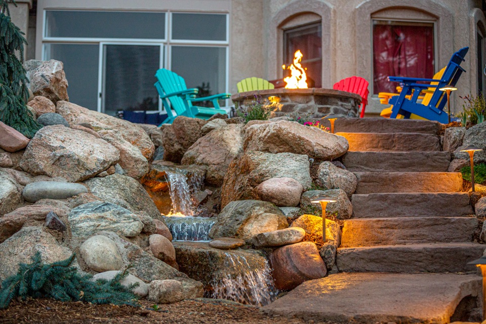 A large natural rock water feature