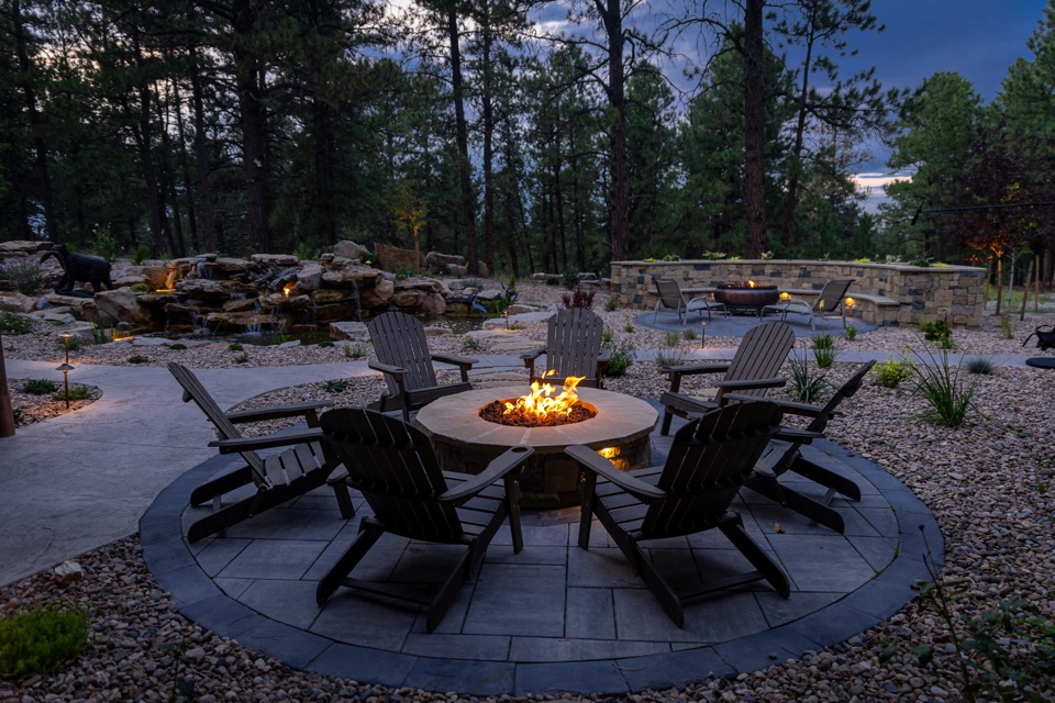 Fire pit with chairs at dusk