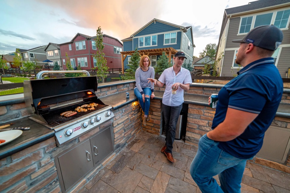 Built-in grill with guests, sunset