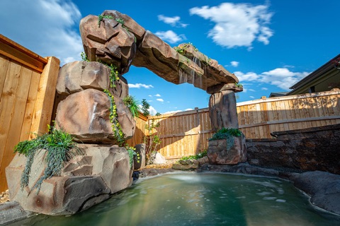 Faux-rock arch over the pool
