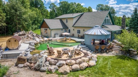 House with natural pool from above