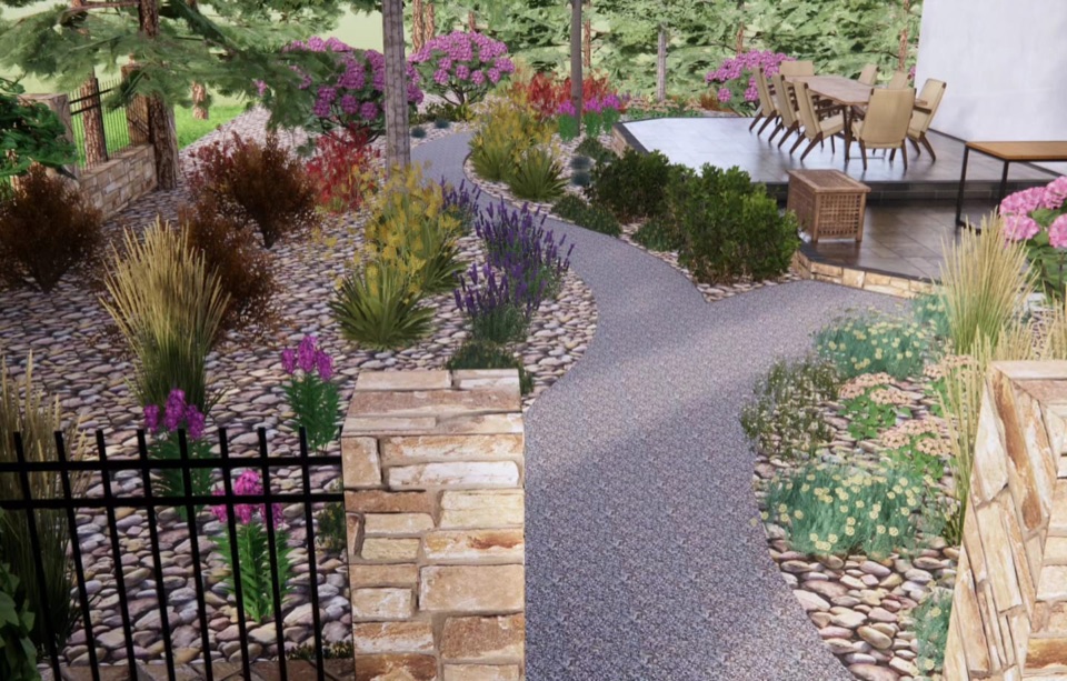 Design render of a gravel path winding through river-rock beds and flowering plants, past a stacked-stone pillar and black iron fence, to a dining patio with a long table