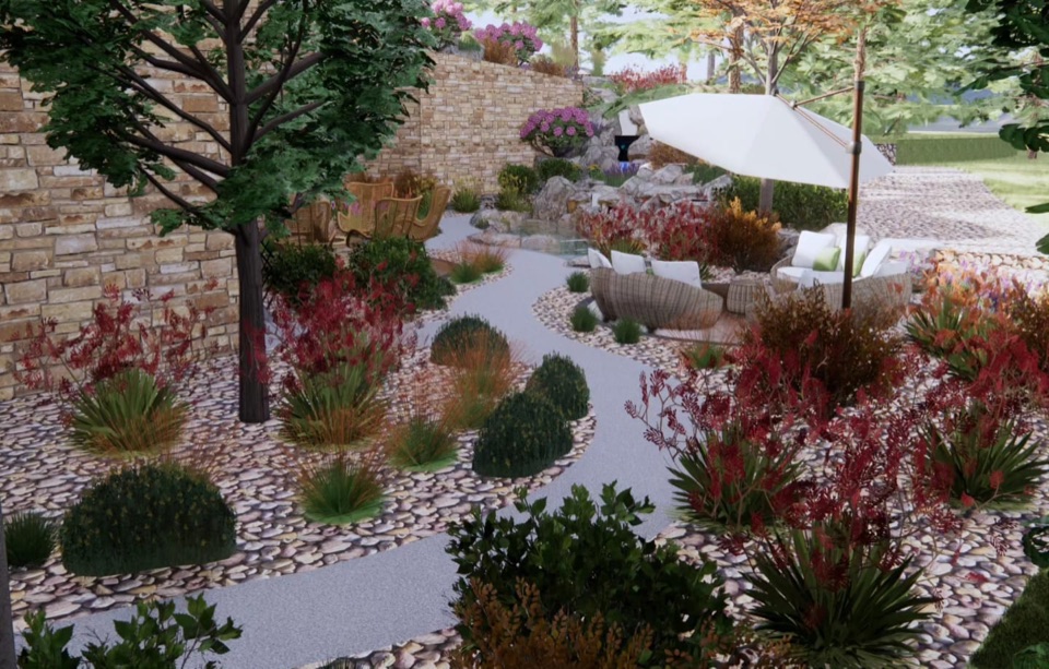 Design render looking down a winding path through red flowering plants, grasses and river rock toward the pond, the fire pit chairs and the lounge under the umbrella